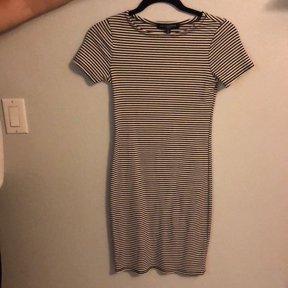 Form fitting black and white stripped dress